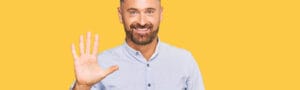 Handsome middle age man wearing business shirt showing and pointing up with fingers number five while smiling confident and happy.
